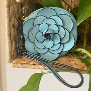 Blue, flower wristlet/coin purse. Never used.